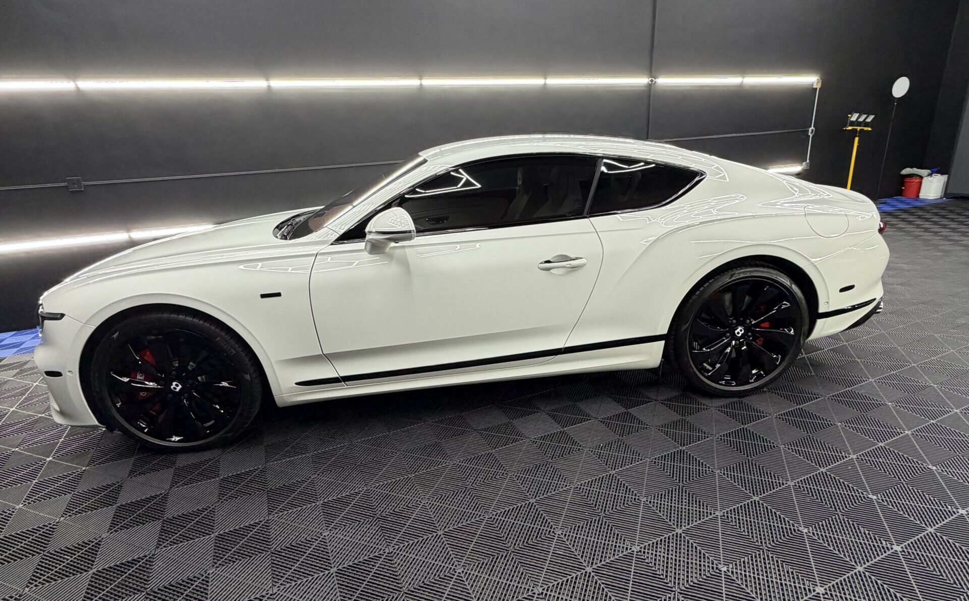 Motiv Auto ceramic coating and paint protection for a white Bentley in Pompano Beach